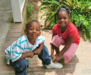 Boy and girl smile for photo Boy and girl smile for photo