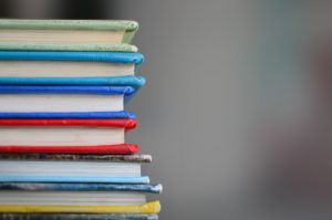 Image of a stack of books (Photo by Kimberly Farmer on Unsplash) Image of a stack of books (Photo by Kimberly Farmer on Unsplash)