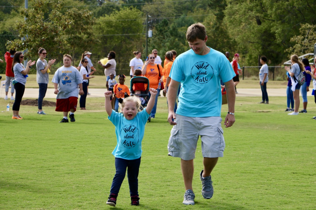 a child enjoys buddy walk