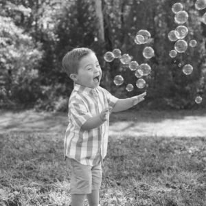 Corban chases bubbles
