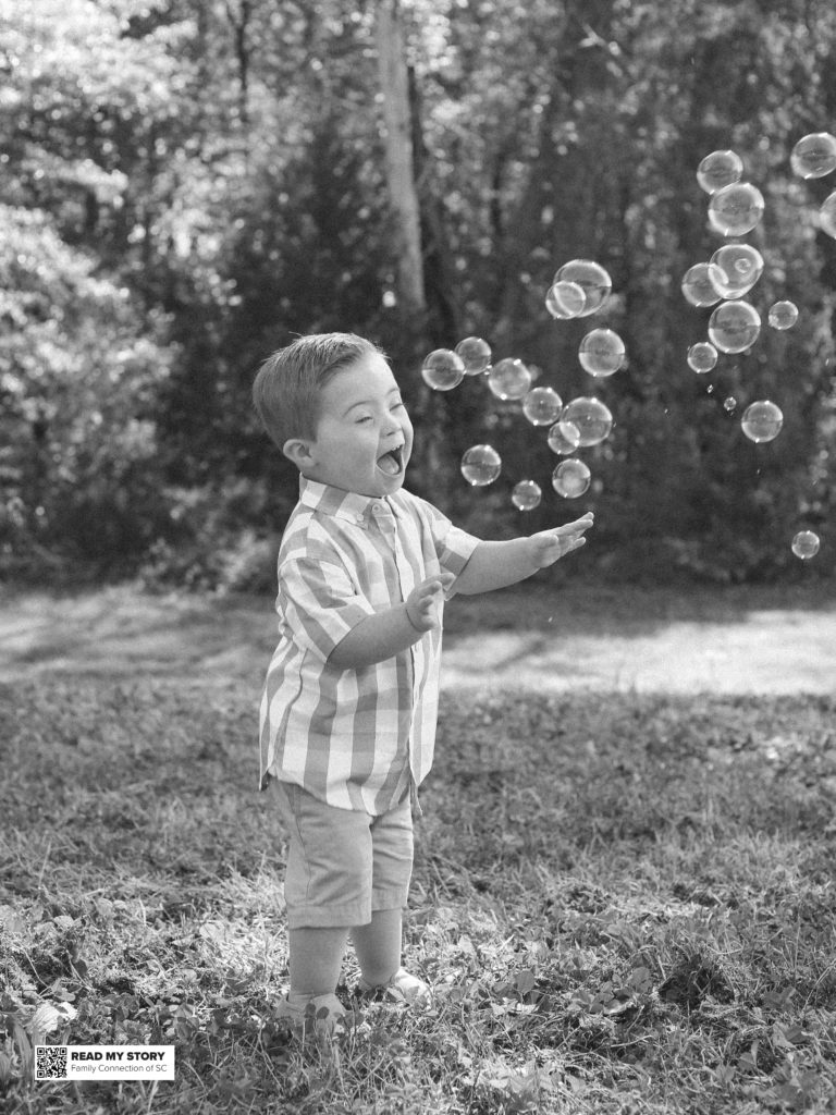 Corban chases bubbles