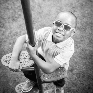 Boy plays on a playground