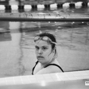 woman swims in a pool