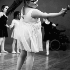 young girl dances in a dance class