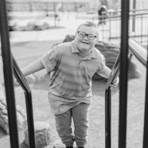 boy plays on a play ground