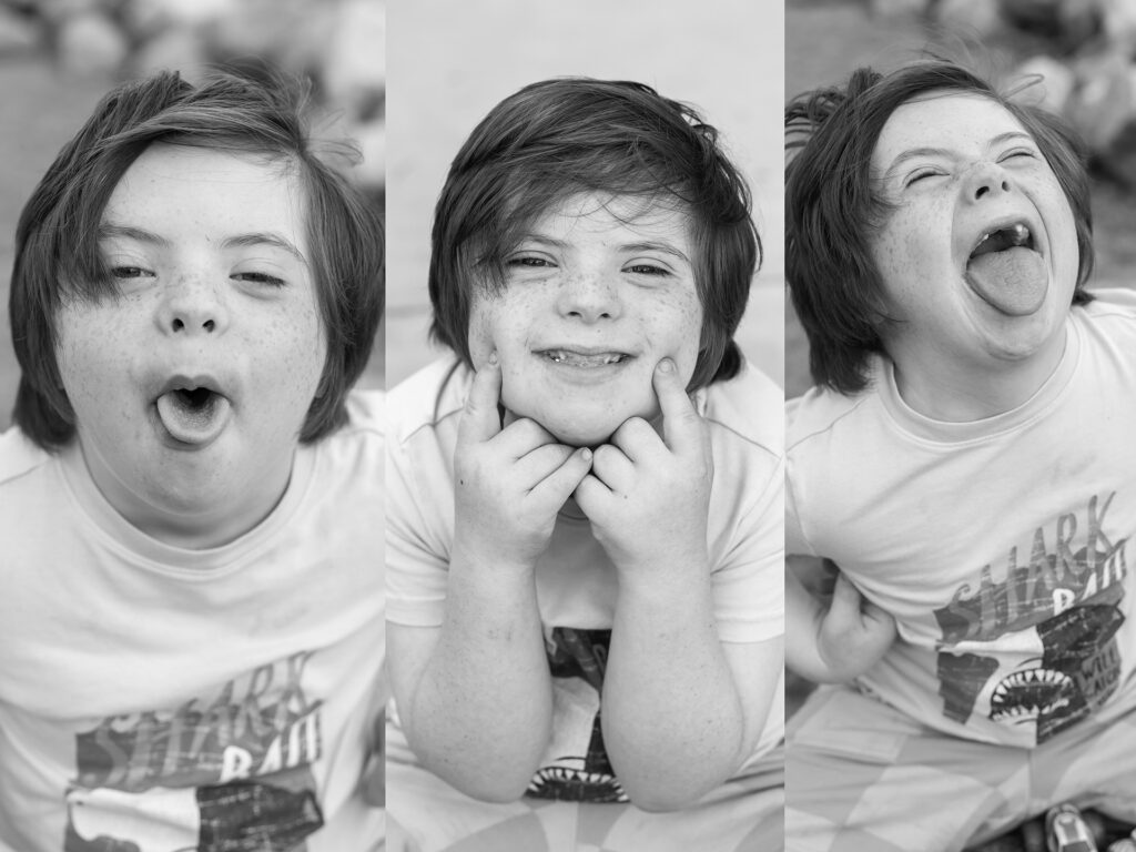 boy smiles and makes silly faces
