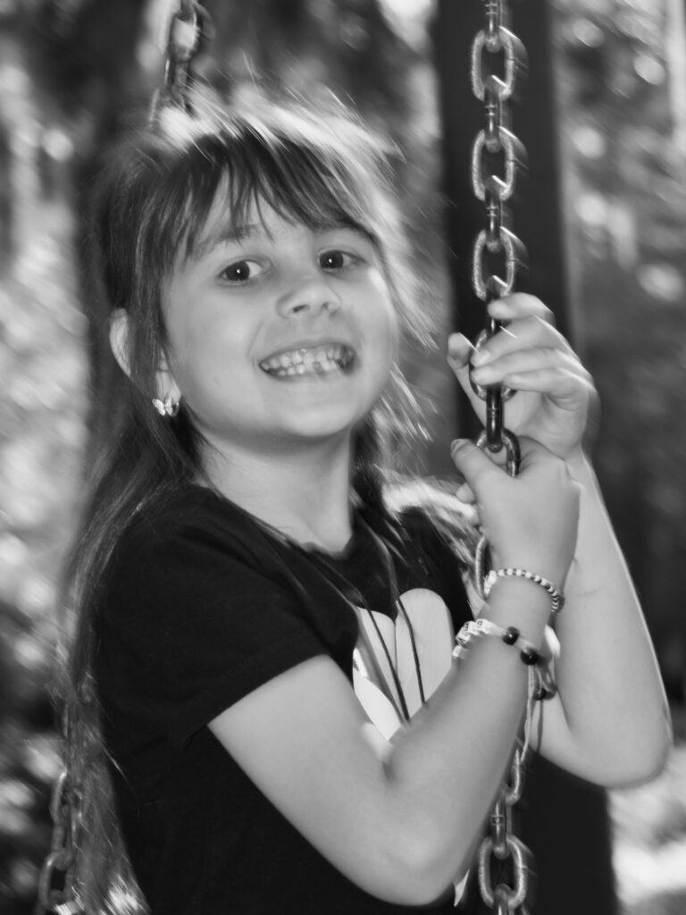 happy girl on swing