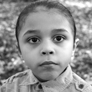 boy looks at the camera