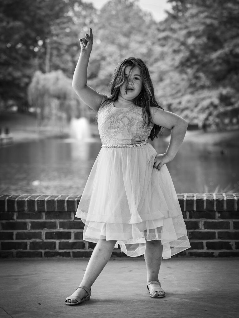 girl strikes a dancing pose