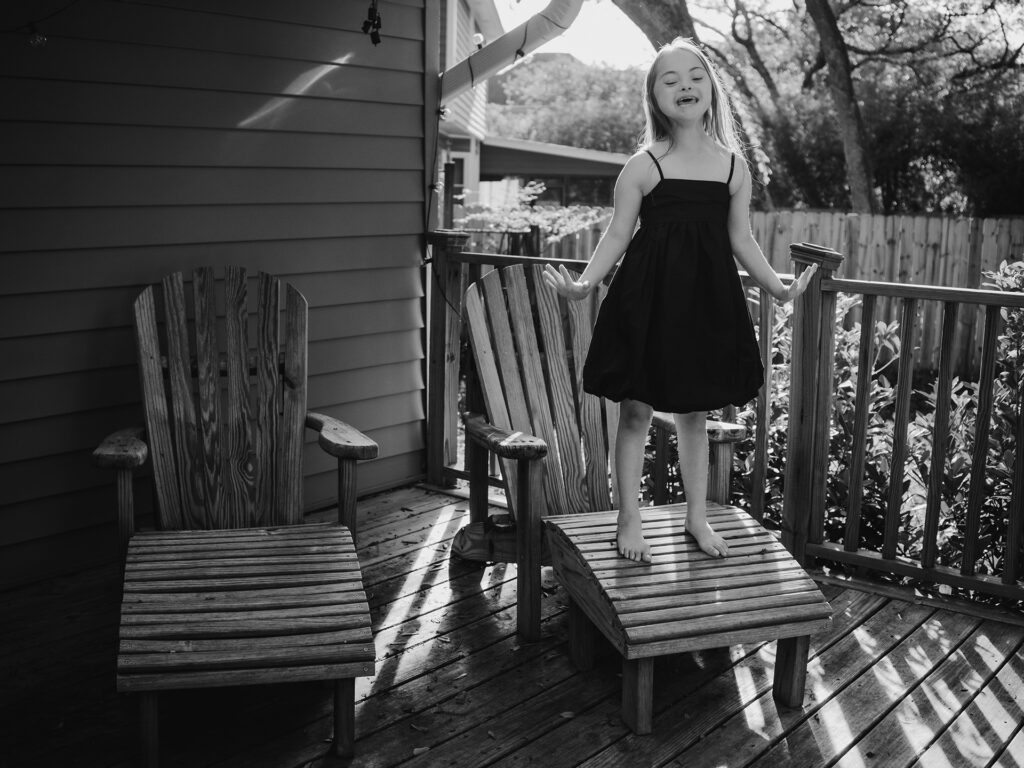 girl sings standing on a chair