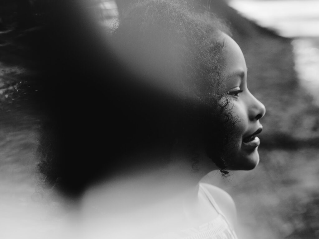 artistic photo of a girl with curly hair