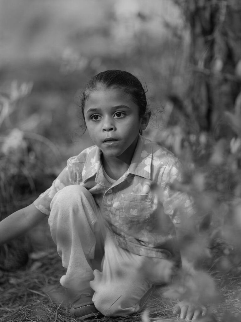 boy plays in the forest