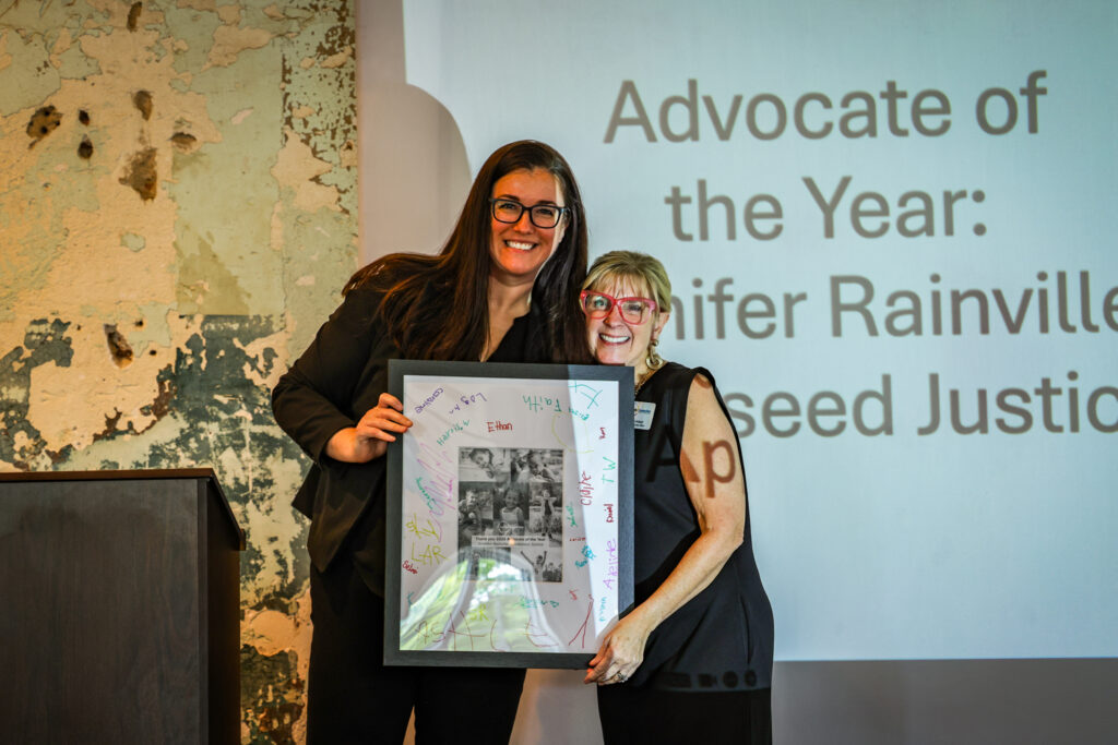 Jennifer Rainville receives an award